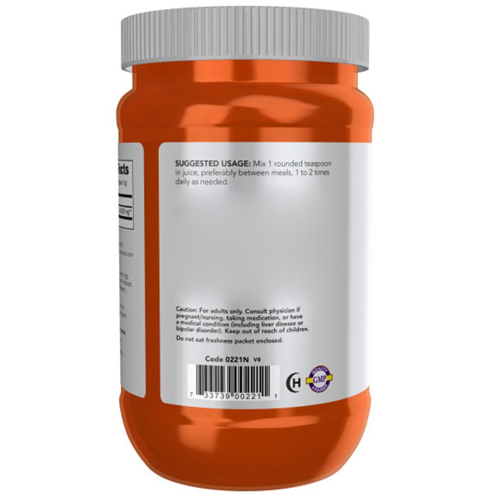 Dos d'un pot orange. Étiquette avec instructions d'utilisation et avertissements. Contient un sceau de qualité.