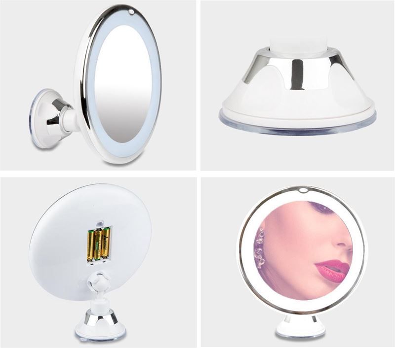 Quatre vues d'un miroir grossissant blanc avec lumière LED et ventouse.
