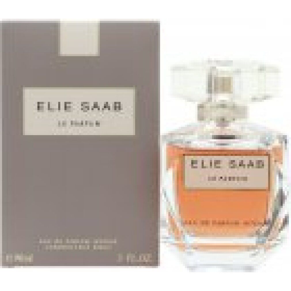 Emballage gris et flacon de parfum. Flacon avec ELIE SAAB LE PARFUM. Inscription. Flacon avec liquide doré.