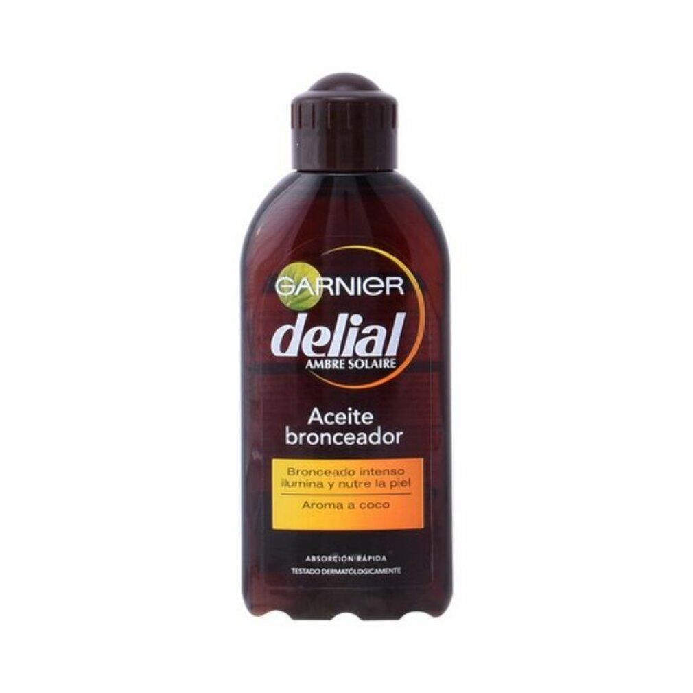 Garnier Delial Ambre Solaire Ideal Bronze huile bronzante dans une bouteille brune avec bouchon brun et étiquette.