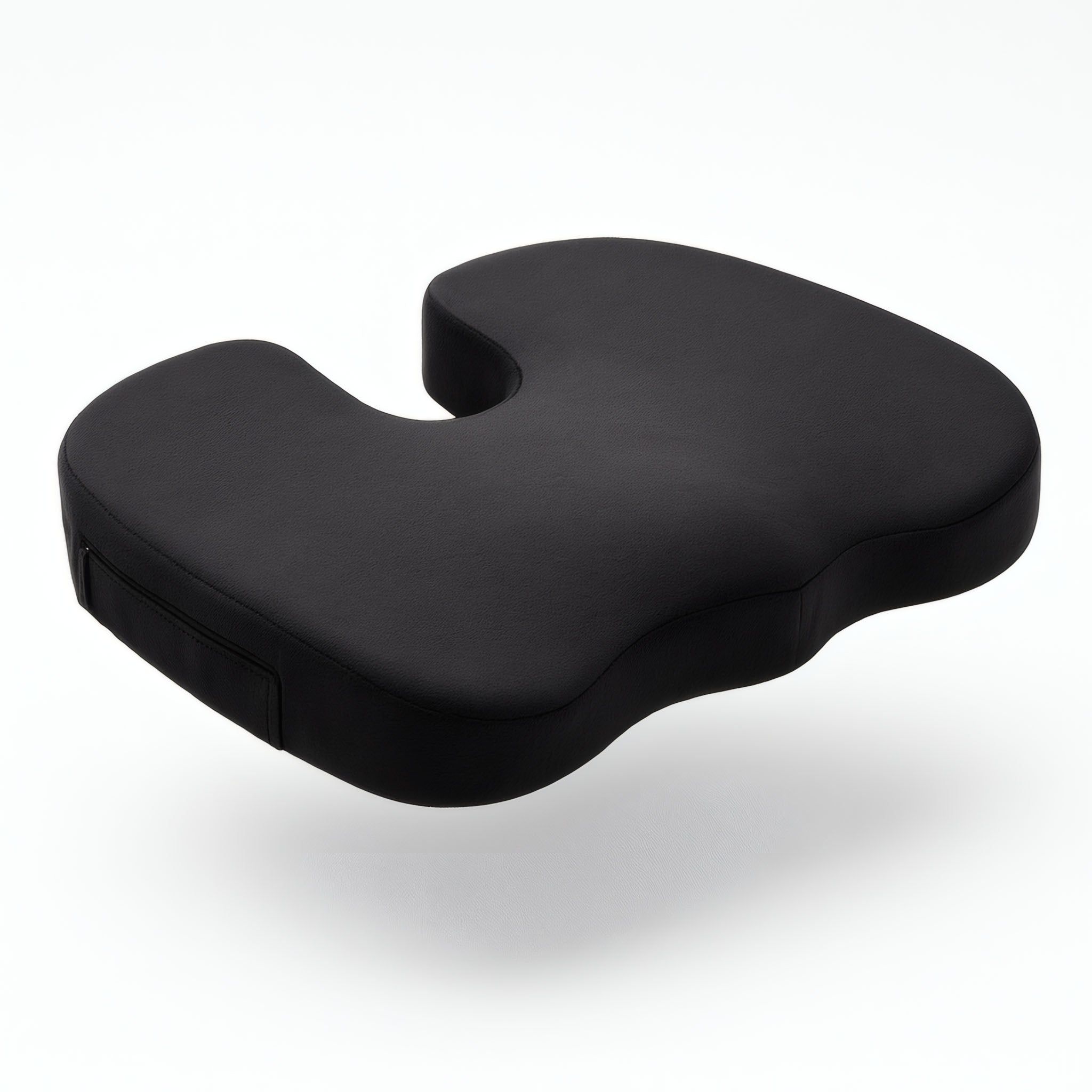 Zwart, ergonomisch zitkussen met uitsparing voor drukverlichtend zitten.