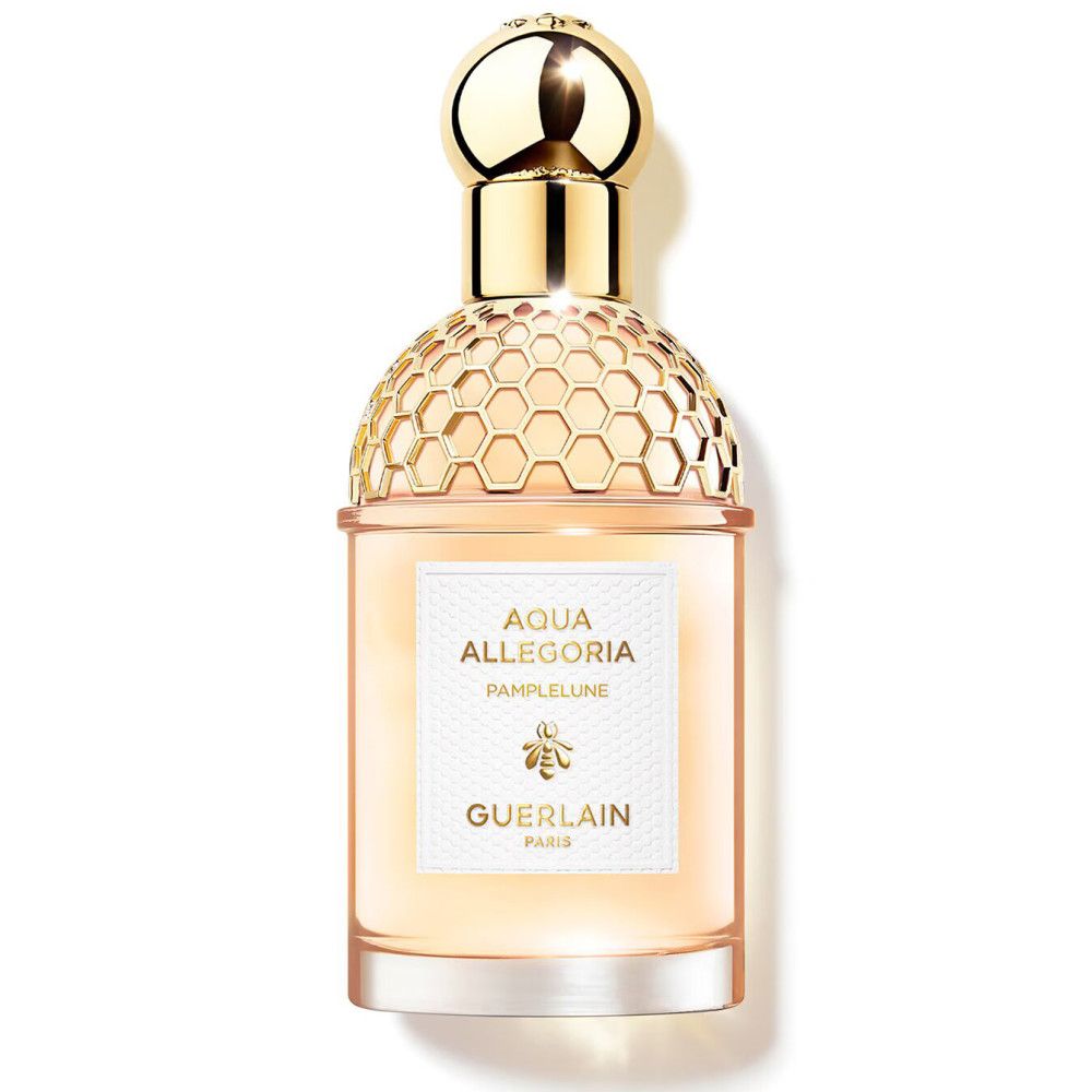 Flacon de parfum. Inscription: Aqua Allegoria Pamplelune, Guerlain Paris. Bouchon doré.