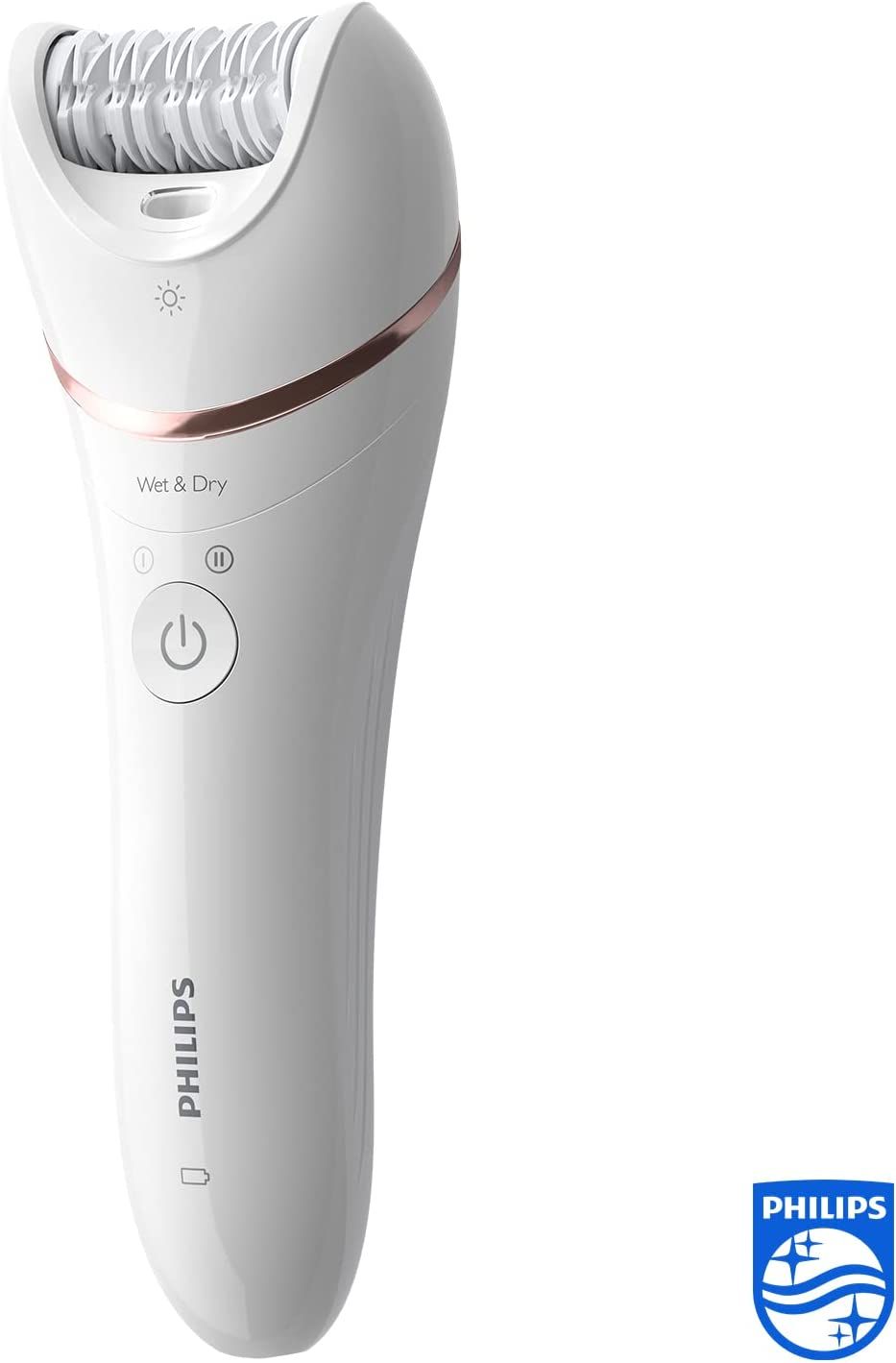 Épilateur blanc avec accents or rose. Inscription Philips. Wet & Dry. Logo Philips.