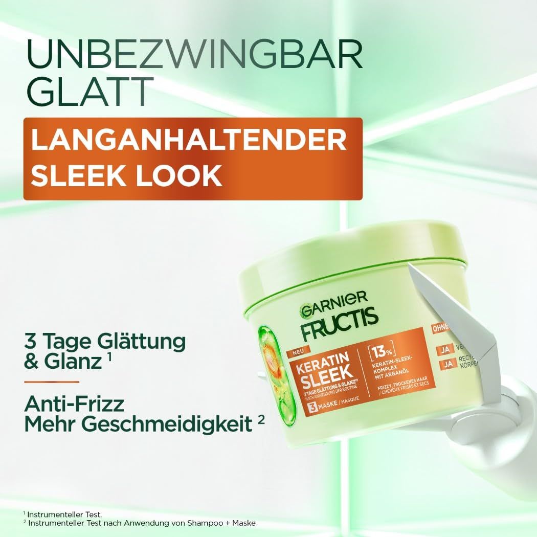Garnier Fructis Keratin Sleek Masker. Groene pot met oranje label. Tekst: 3 dagen glad & glans, anti-frizz.