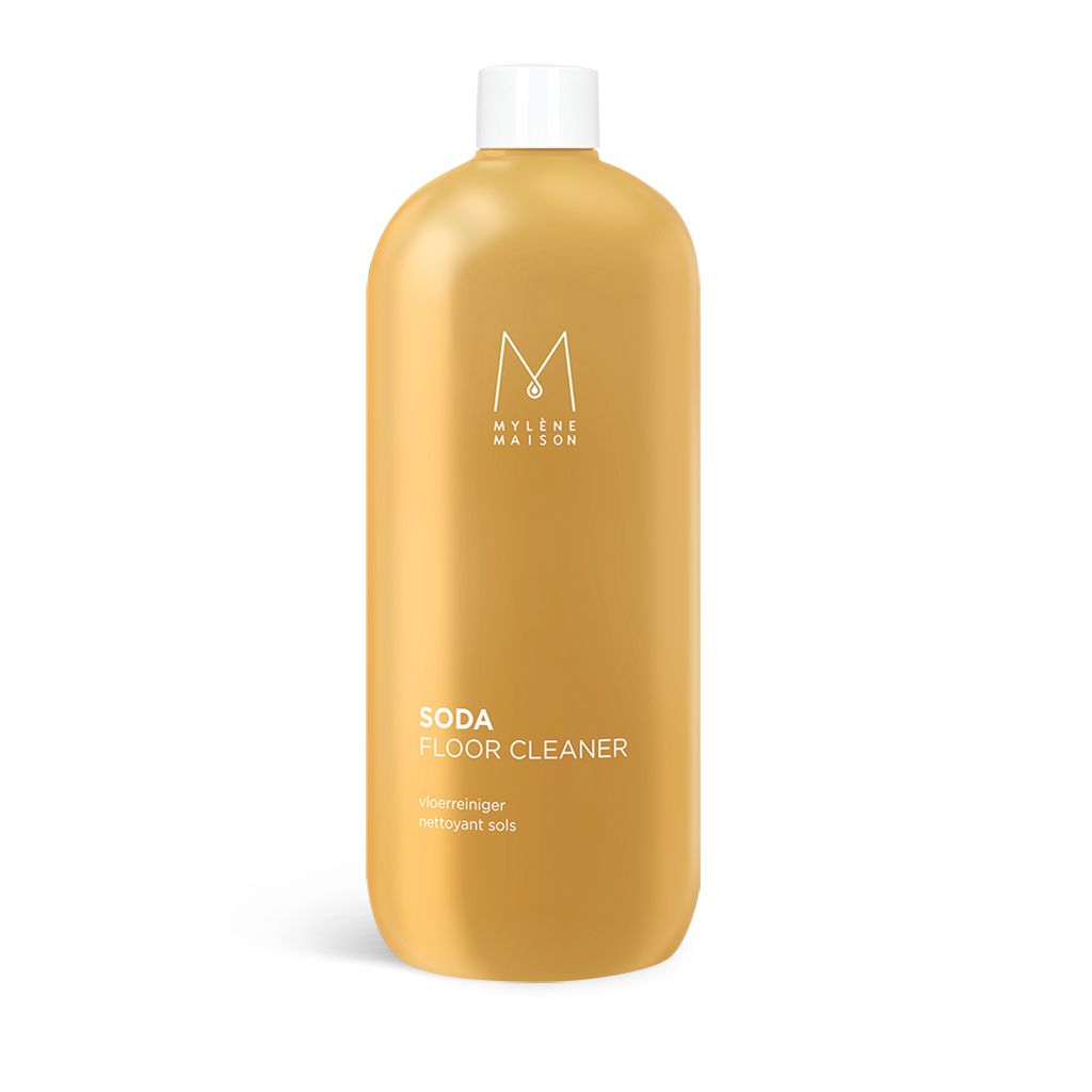 Gouden fles met witte dop. Opschrift "MYLENE MAISON SODA FLOOR CLEANER".