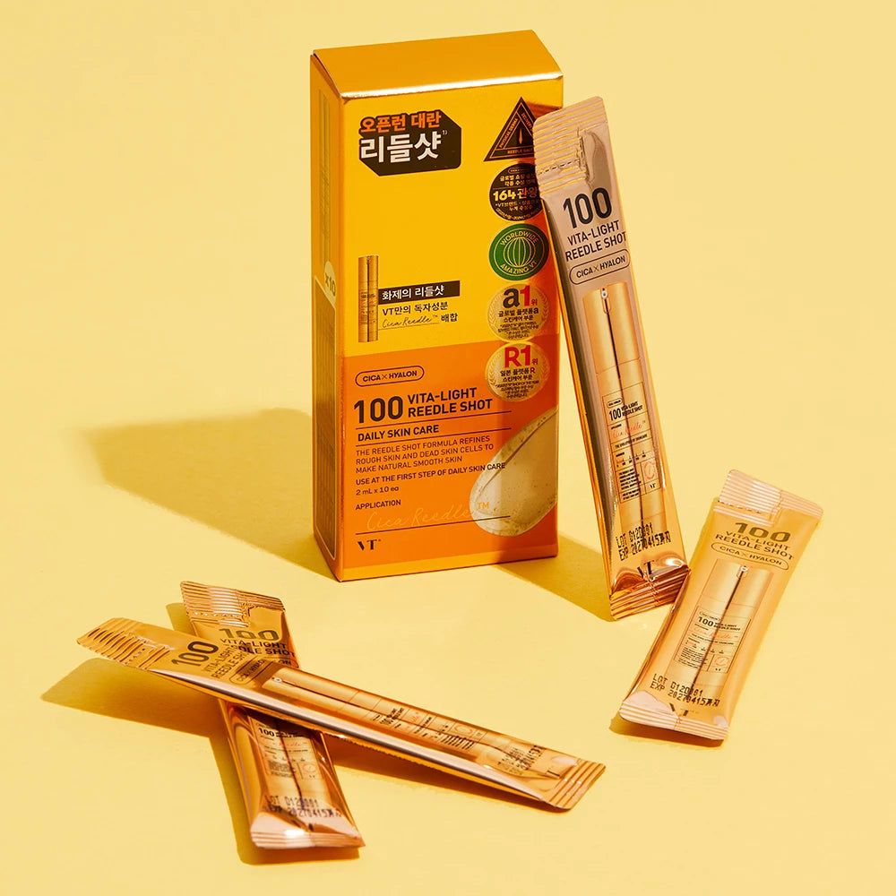 Verpakking en individuele ampullen van VT COSMETICS 100 Vita-Light Reedle Shot.