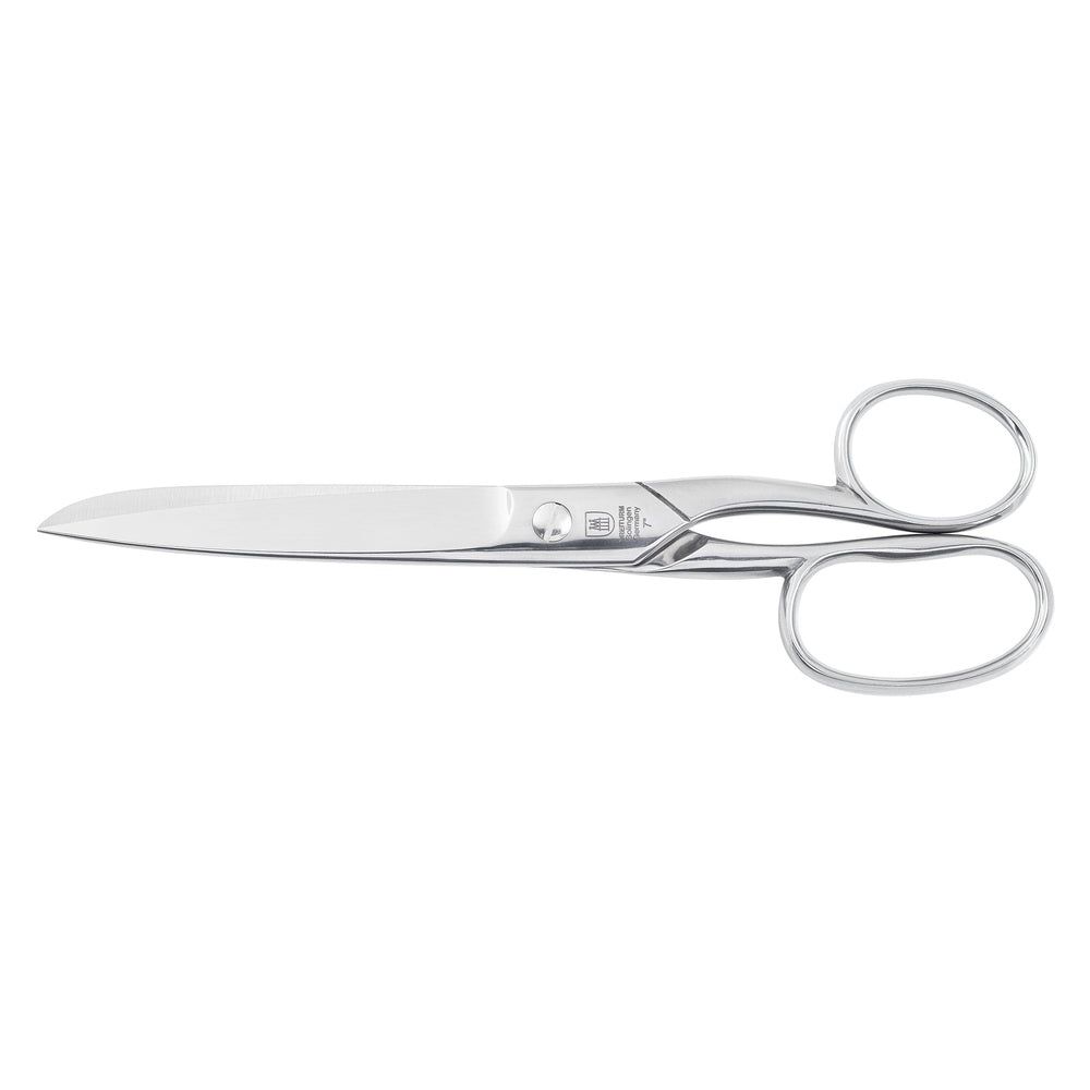 Ciseaux argentés avec poignées arrondies. Logo et texte sur la lame.