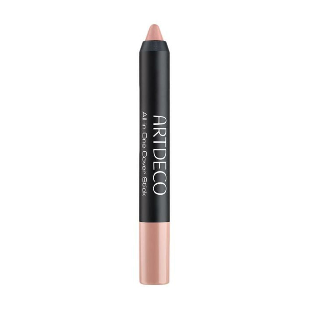 Coverstick. Zwart-beige stick met product- en merknaam. De stick heeft een ronde vorm.