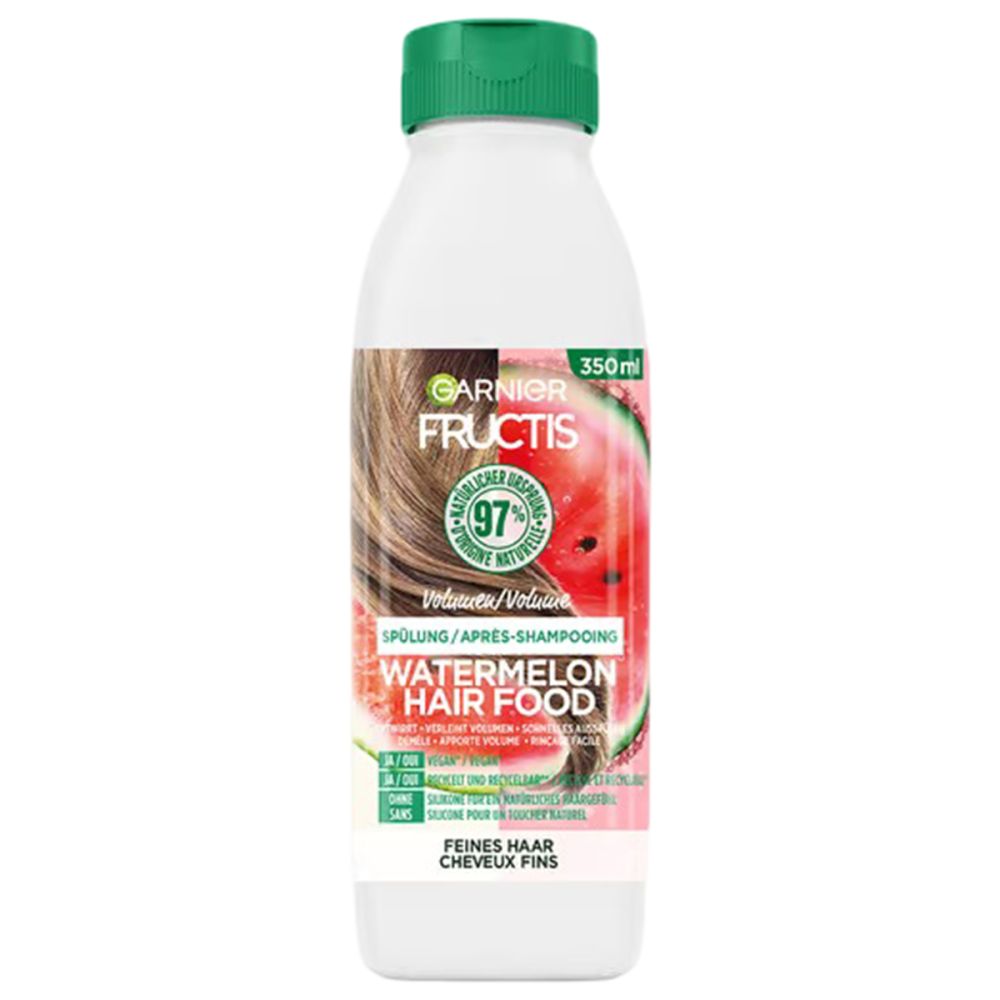 Bouteille Garnier Fructis Volumen Spülung. Bouchon vert. Nom du produit et illustration de pastèque.