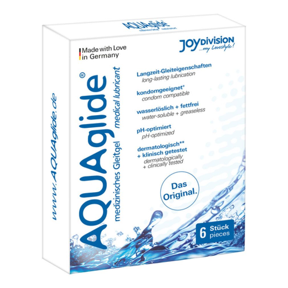 Boîte blanche avec texte "AQUAglide". Contient 6 sachets individuels. Inscriptions : "lubrifiant médical", "compatible préservatif", "pH optimisé".
