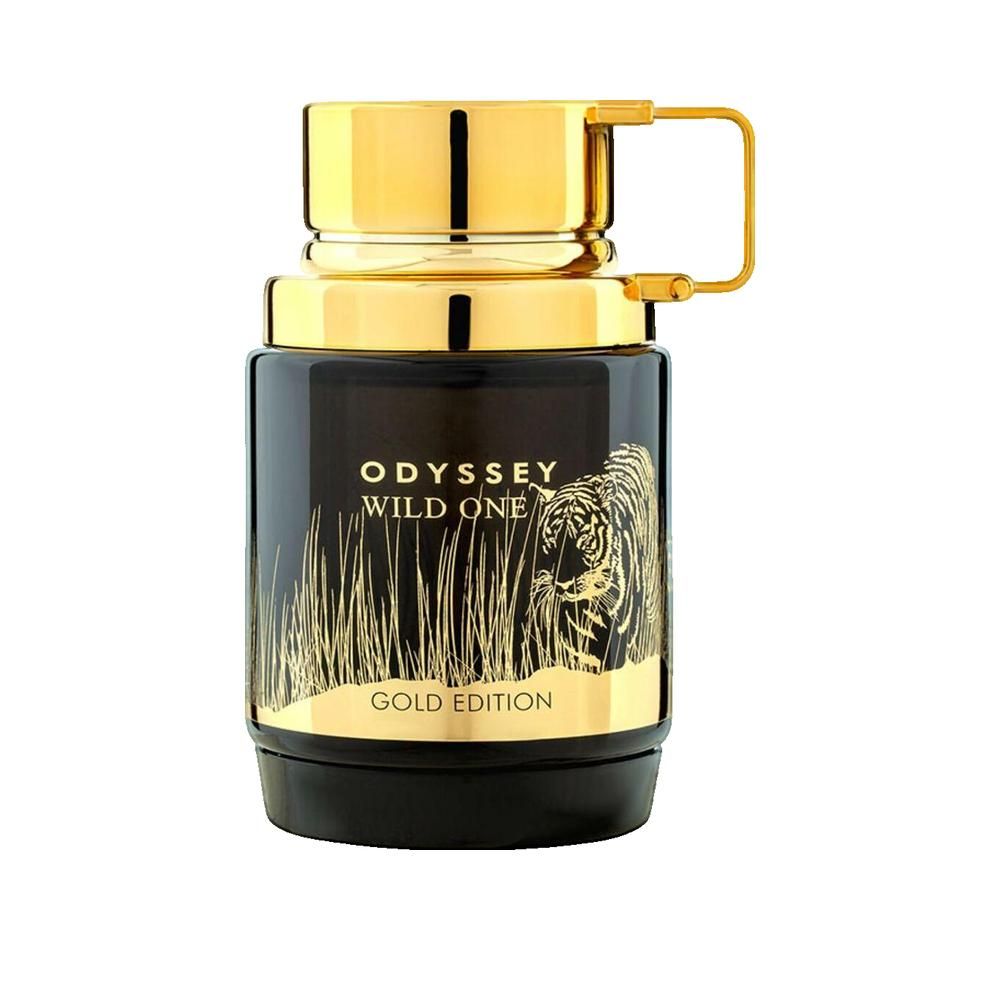 Flacon noir avec bouchon et poignée dorés. Inscription: ODYSSEY WILD ONE GOLD EDITION. Illustration d'un tigre dans l'herbe.