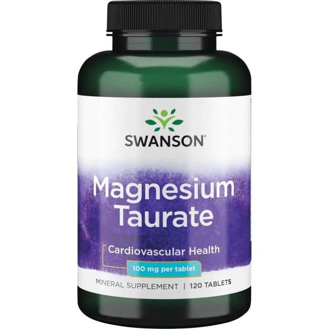 Flacon vert avec bouchon noir. Inscription: SWANSON Magnesium Taurate, 100 mg par comprimé. Complément minéral.