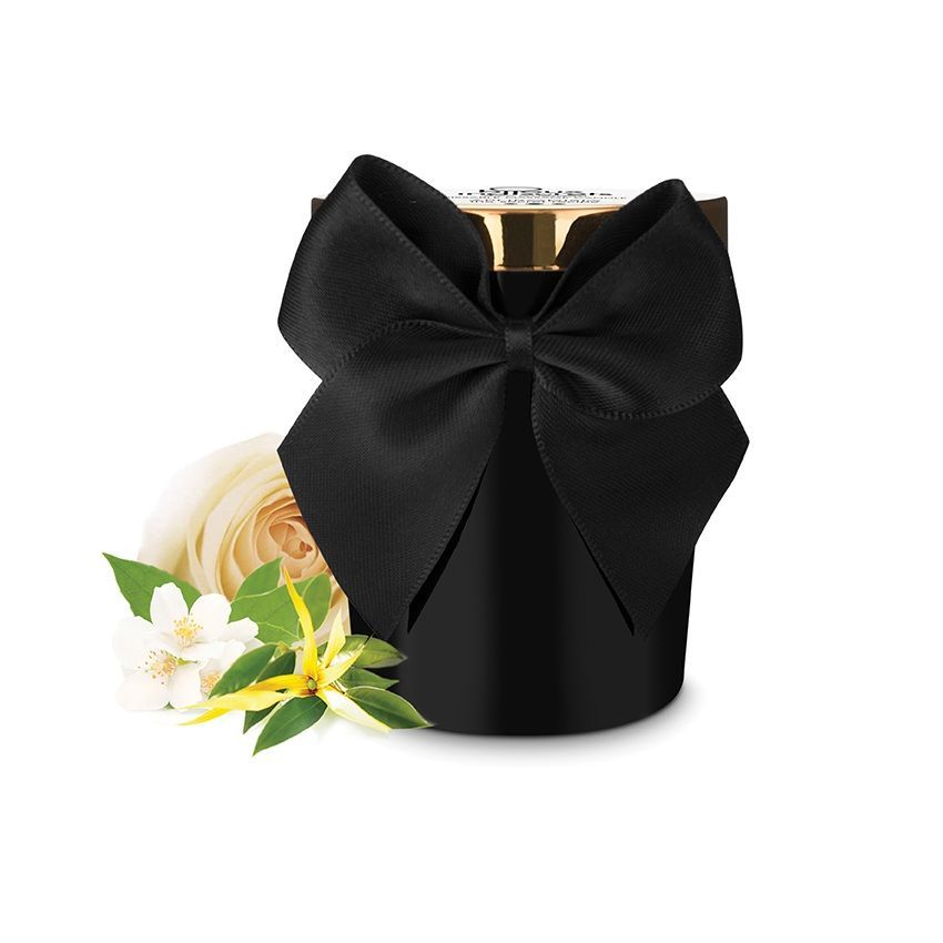 Bougie noire avec nœud, couvercle et fleurs. Inscription sur le couvercle. Bijoux Indiscrets.
