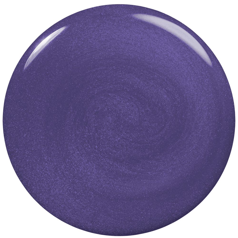 Tache circulaire de vernis à ongles violet. Surface brillante.