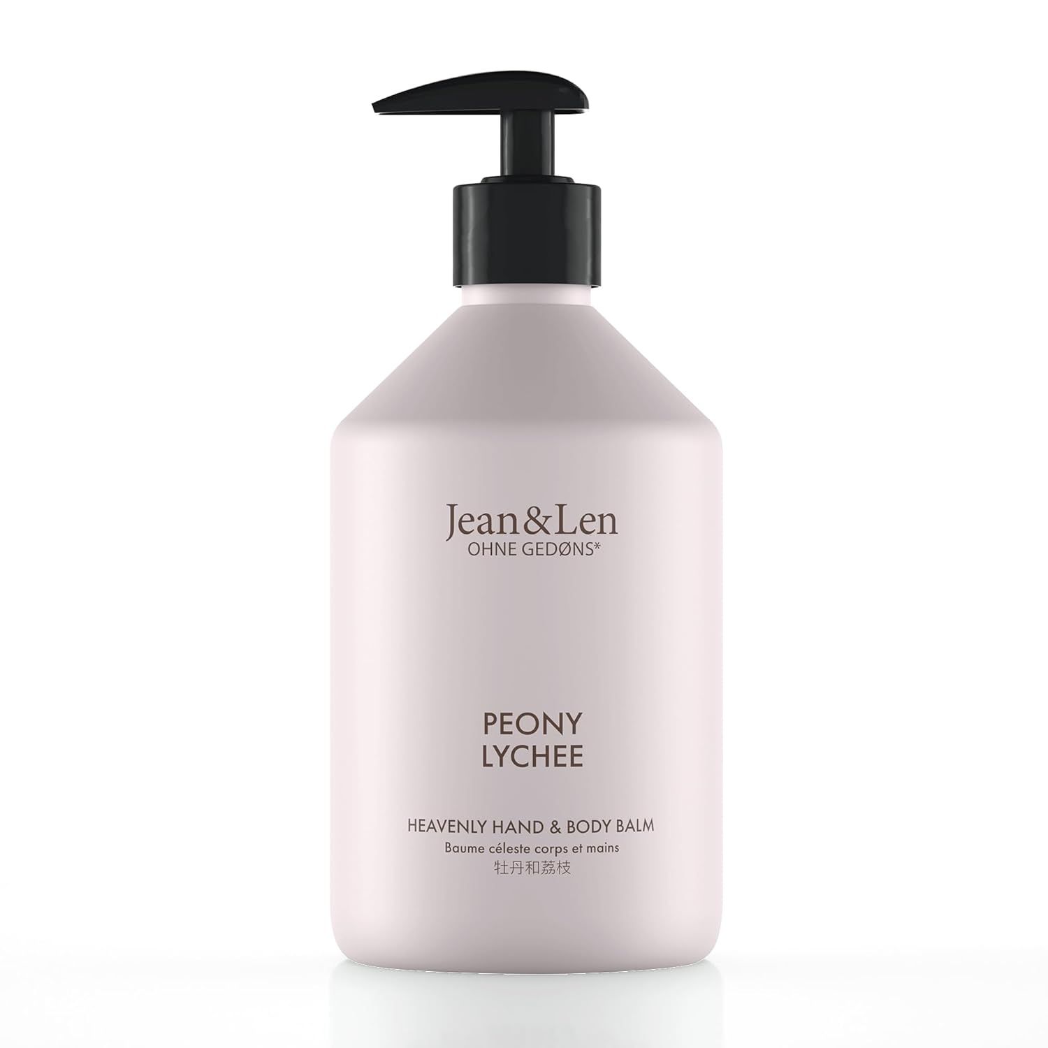 Flacon blanc avec pompe noire. Inscription: PEONY LYCHEE, Heavenly Hand & Body Balm.