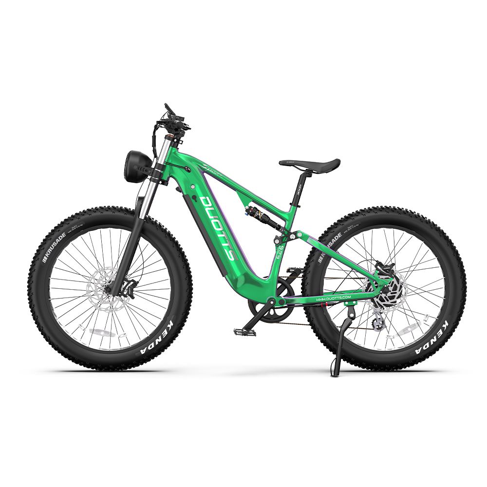 Groene elektrische mountainbike, brede banden, DUOTTS-logo en koplamp.