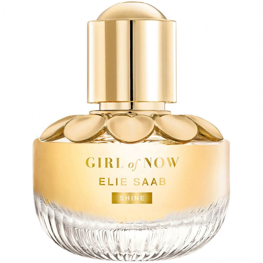 Flacon de parfum avec bouchon doré et design floral. Inscription 'GIRL of NOW' et 'ELIE SAAB'.