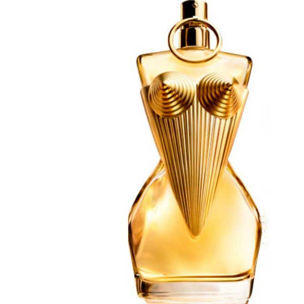 Gouden parfumfles in de vorm van een bovenlichaam. Fles met details die de borst en het bovenlichaam benadrukken. Op witte achtergrond.