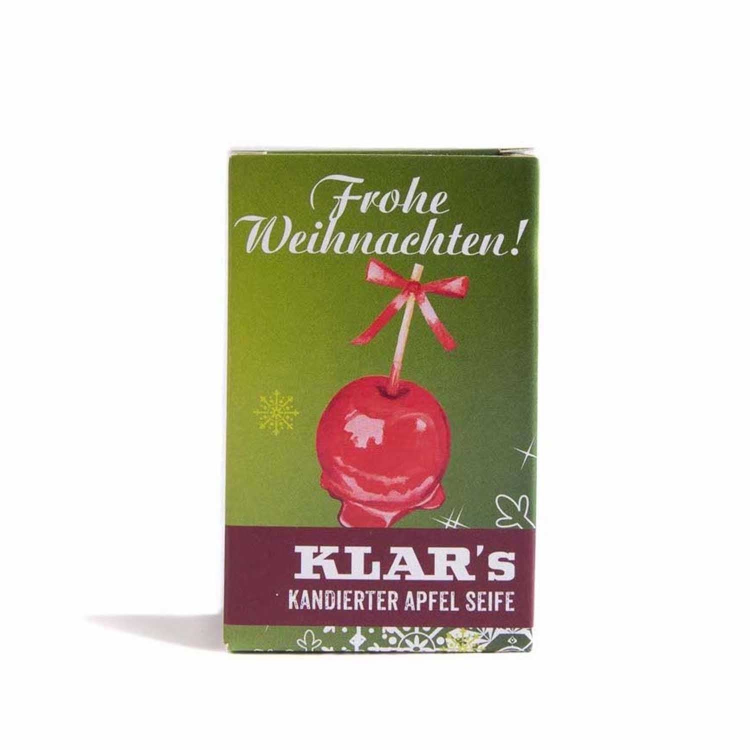 Verpakking met rode appelmotief en opschrift "Frohe Weihnachten!". Klar's gekarameliseerde appelzeep.