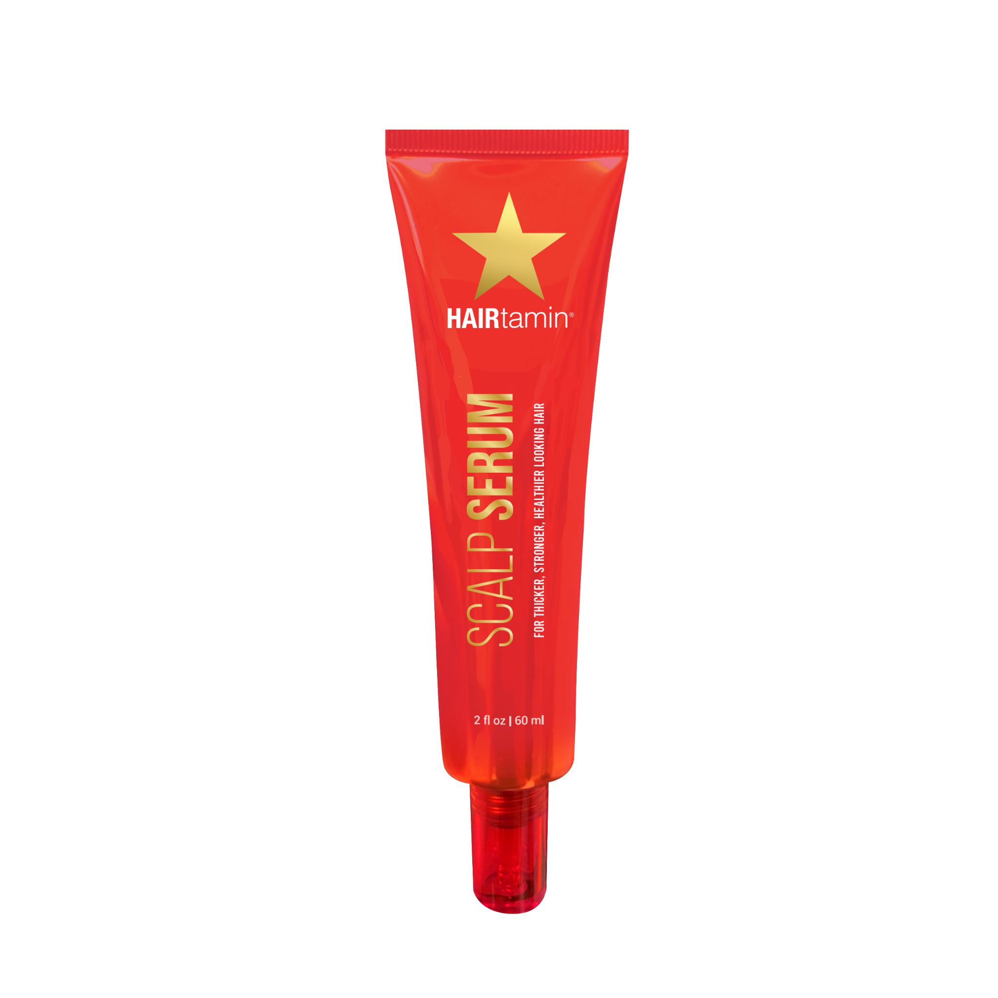 Tube rouge avec étoile dorée et texte. Nom du produit : Scalp Serum. 60 ml.