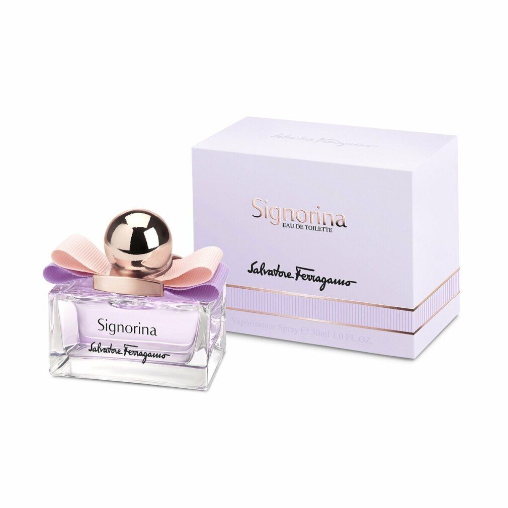 Flacon Signorina Eau de Toilette et emballage. Liquide rose, bouchon doré, nœud. Marque et nom visibles.