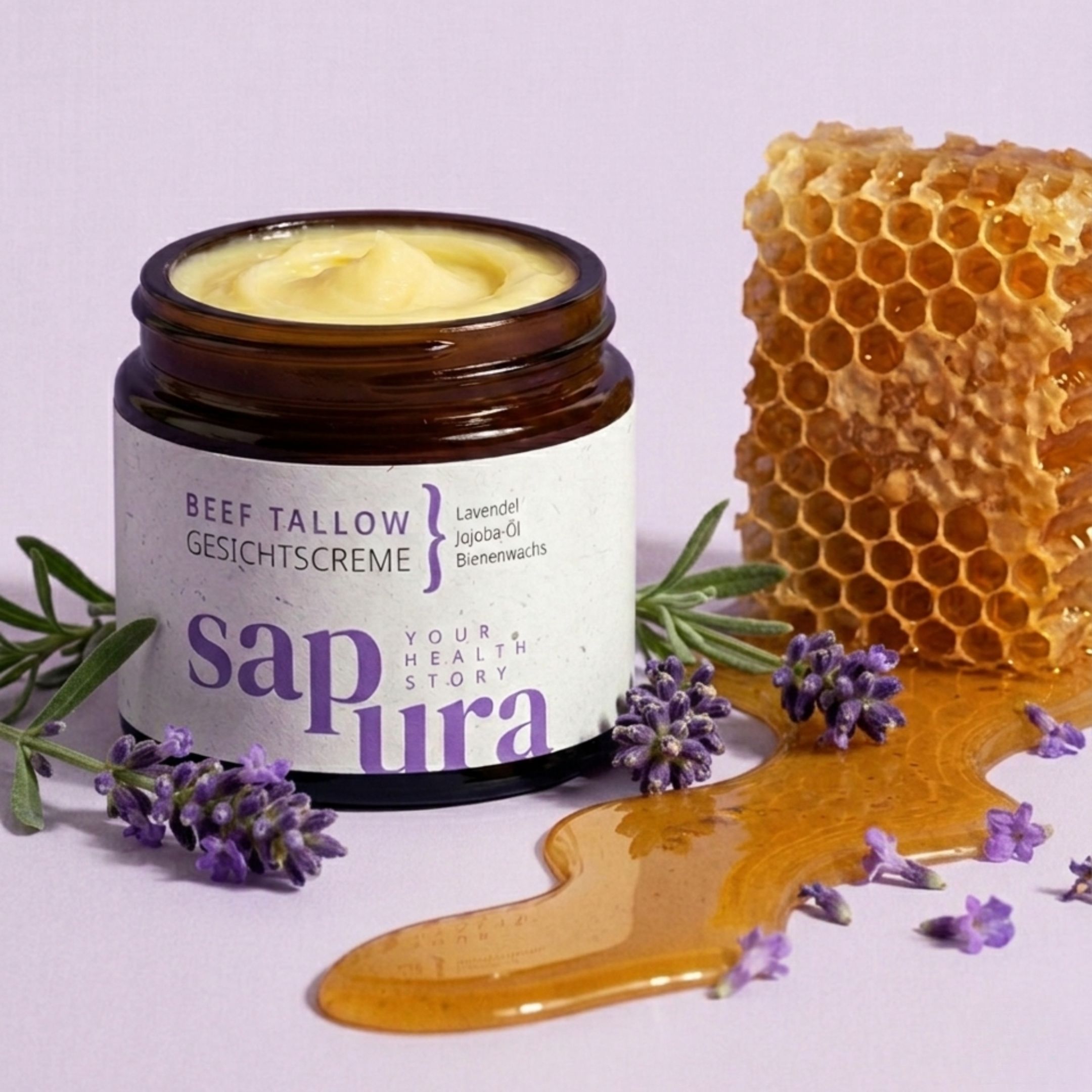 Pot de crème, miel, rayon de miel, brins de lavande. Inscription : BEEF TALLOW GESICHTSCREME. Marque : sapura.