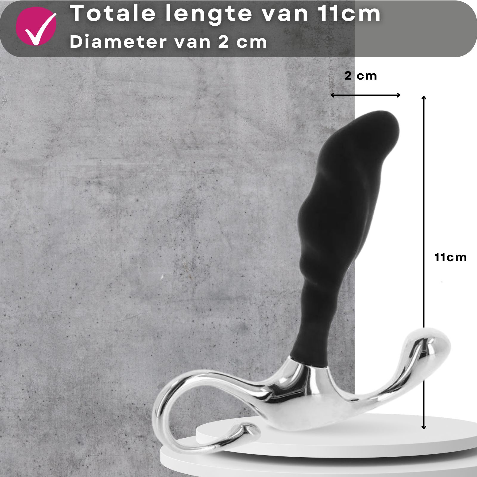 Zwarte vibrator met zilveren handvat, 11 cm lang, 2 cm diameter.
