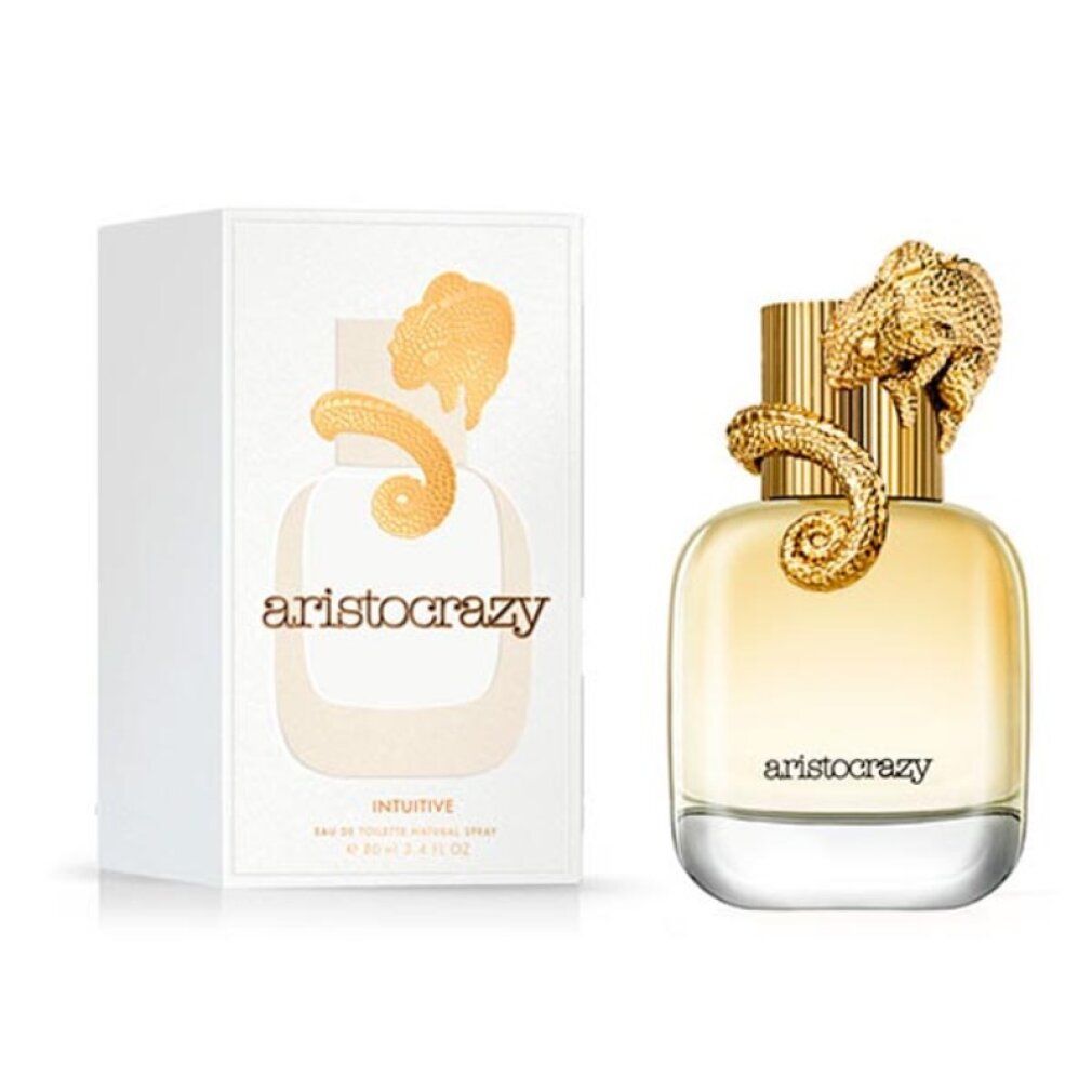 Flacon de parfum et emballage. Bouchon doré en forme de reptile. Emballage avec logo et texte.
