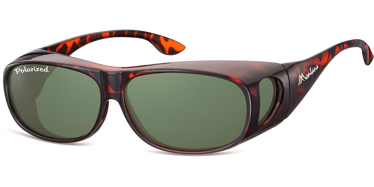 Lunettes de soleil enveloppantes marron et verres verts. Inscription "Polarized" sur le verre. Logo "Montana" sur le côté.