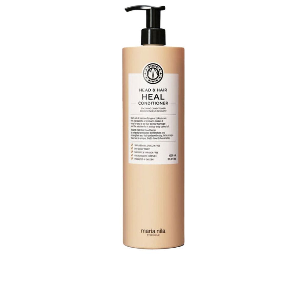 Hoge, beige fles met zwarte pomp. Etiket met tekst: HEAD & HAIR HEAL CONDITIONER. Merk: Maria Nila.