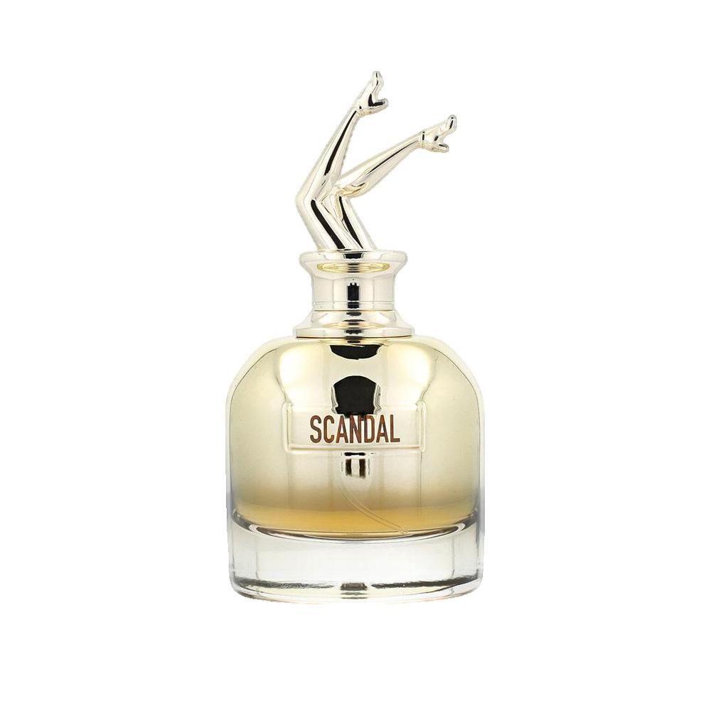 Gouden parfumfles met zilverkleurige dop in de vorm van benen. Opschrift "SCANDAL".