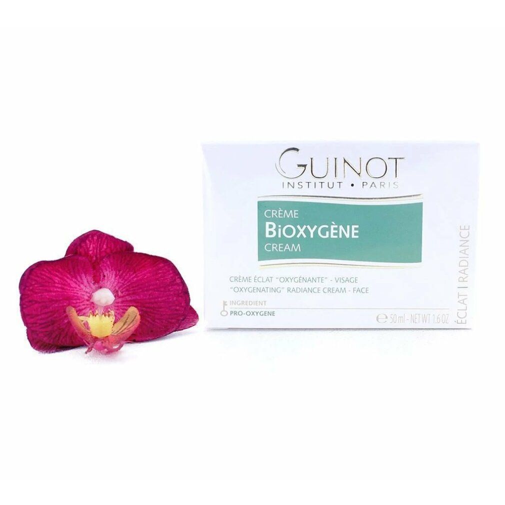 Boîte de Crème Guinot Bioxygene avec une orchidée.