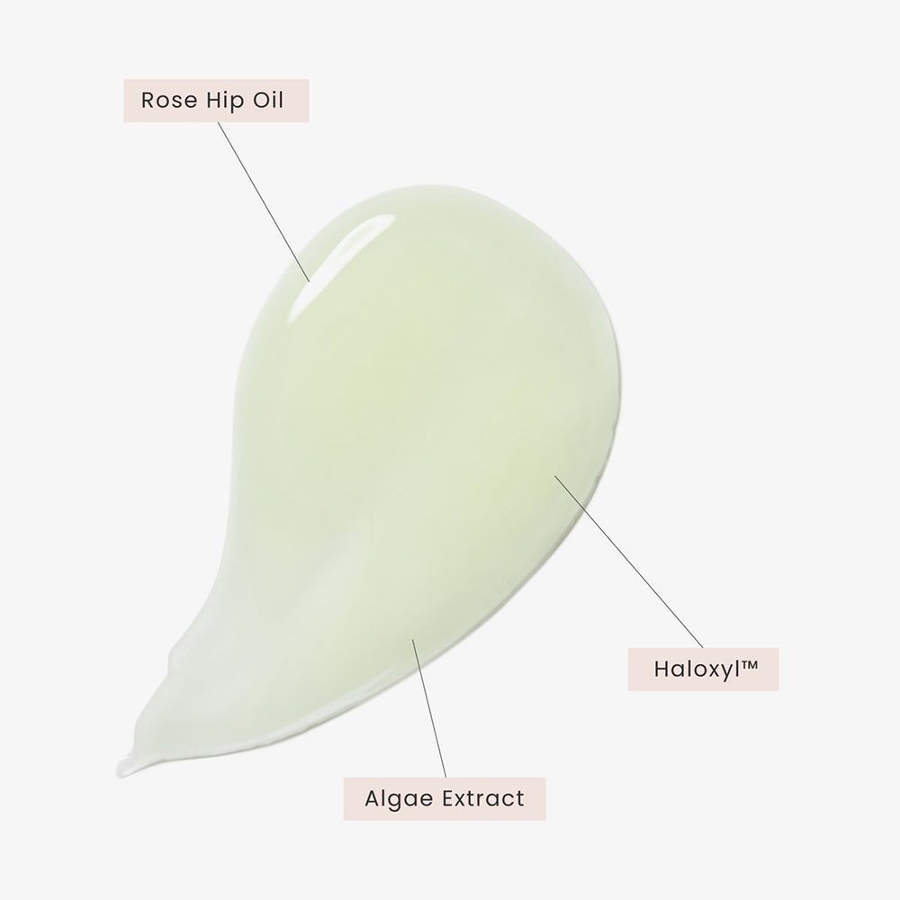 Geldruppel met opschriften: Rose Hip Oil, Haloxyl, Algae Extract.