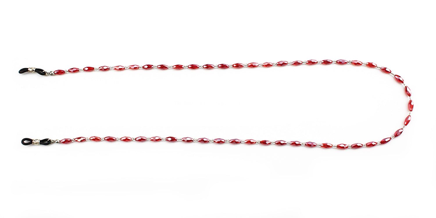 Cordon à lunettes avec perles ovales rouges et connecteurs argentés. Boucles en caoutchouc noir pour la fixation aux lunettes.
