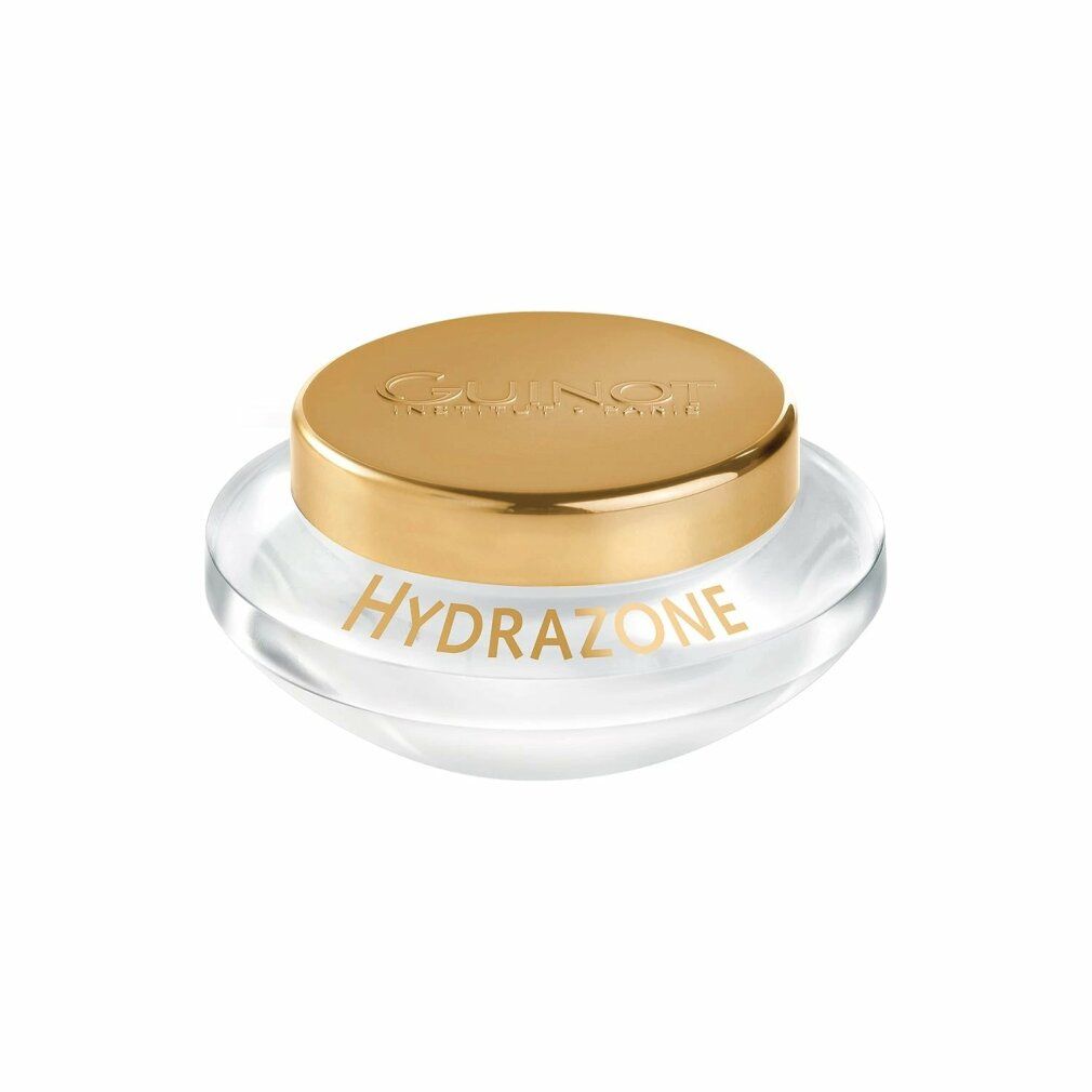 Ronde pot met gouden deksel. Opschrift: GUINOT, HYDRAZONE. Transparante houder.