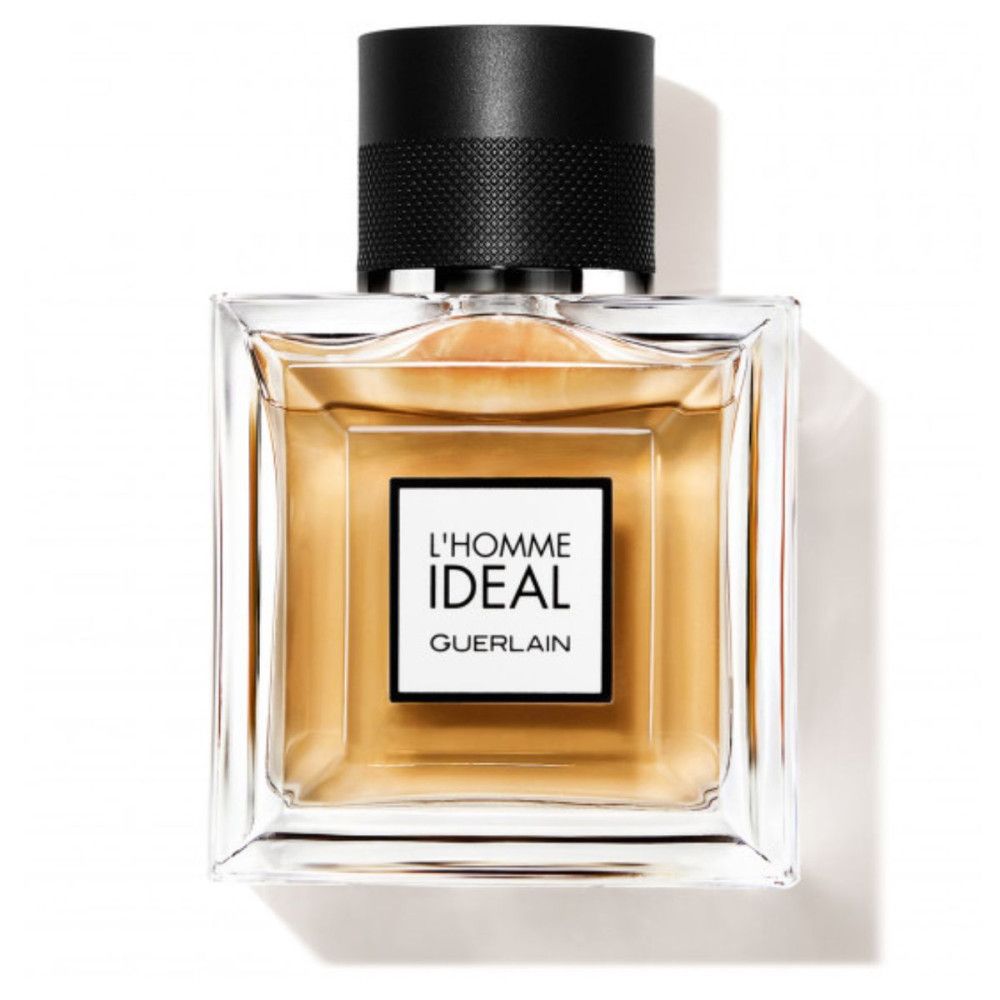Guerlain L'Homme Ideal Eau de Toilette fles. Rechthoekige fles met zwarte dop en gouden vloeistof.