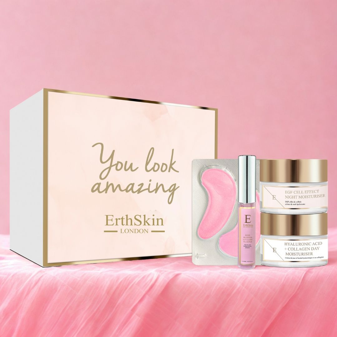 Coffret cadeau ErthSkin London avec pads pour les yeux, sérum et crèmes. Inscription "You look amazing". Accents roses et dorés.
