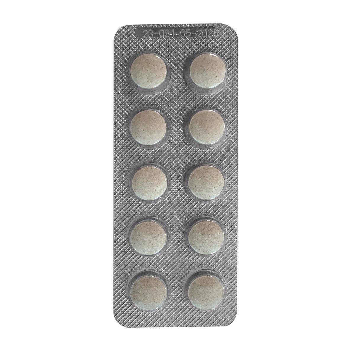 Plaquette thermoformée de 10 comprimés. Comprimés ronds et beiges. Emballage en matériau argenté.