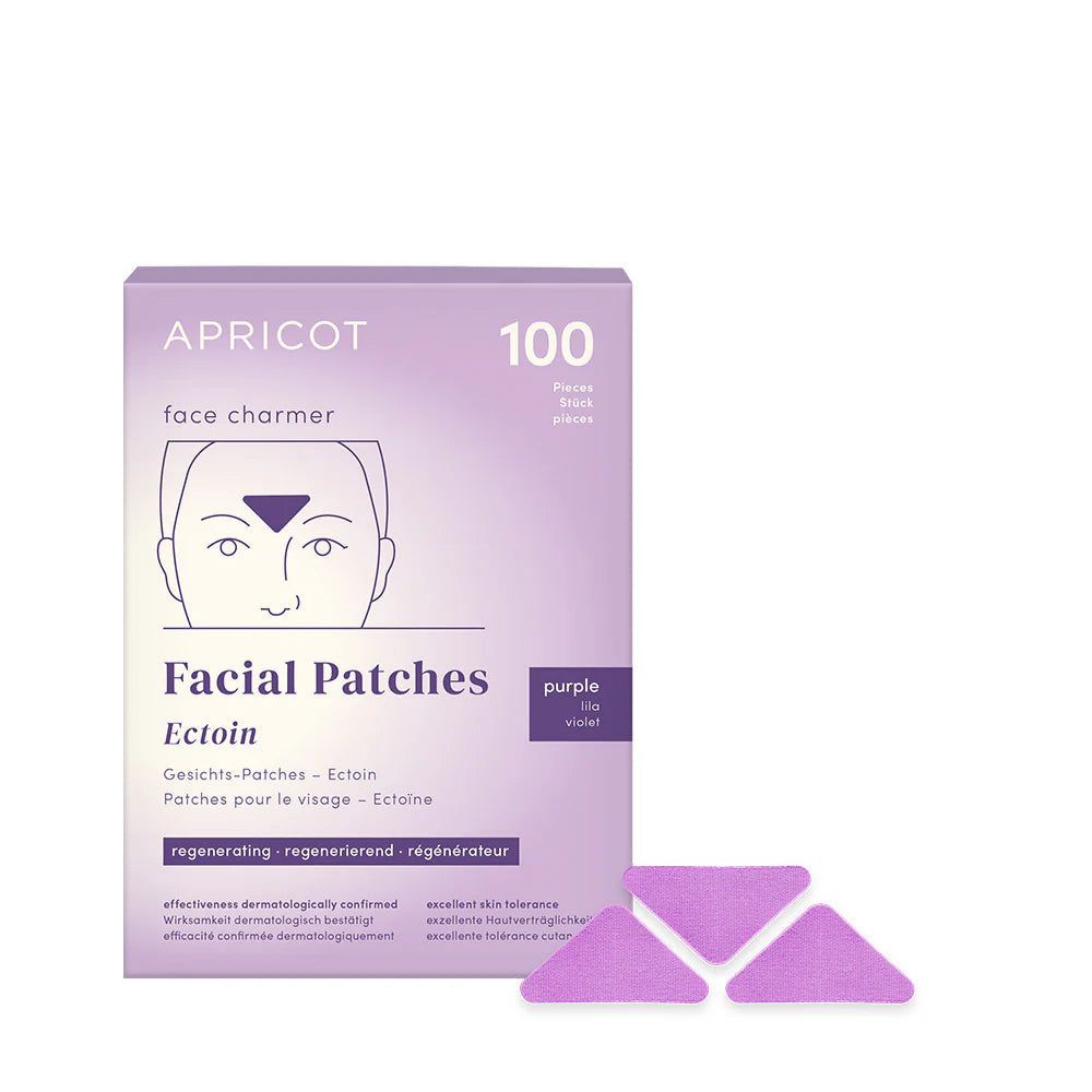 Verpakking van APRICOT gezichtspatches. Paarse doos met productnaam en 100 patches. Drie patches ernaast.