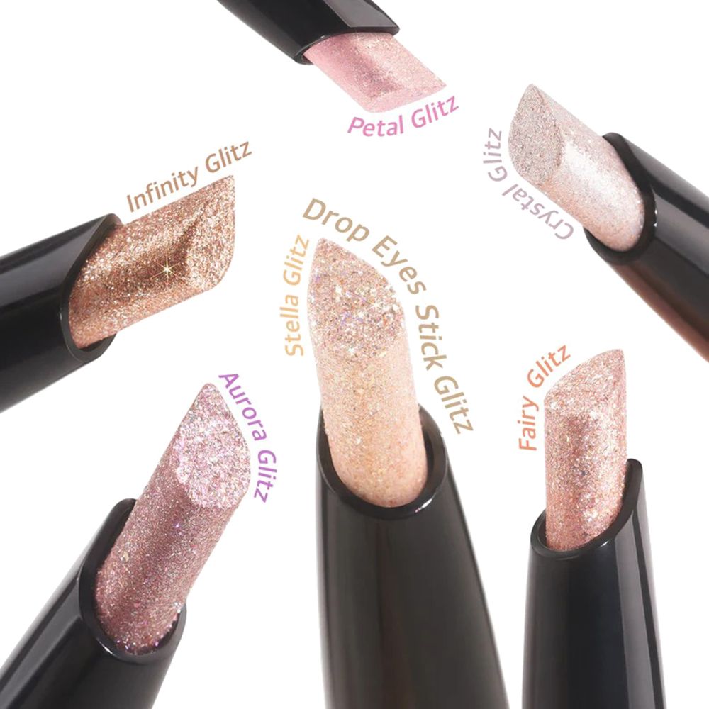Différents fards à paupières Drop Eyes Stick Glitz. Six crayons avec différentes teintes. Nom du produit et noms de couleurs.