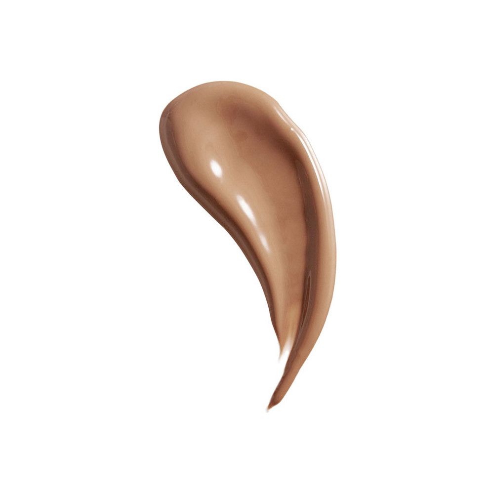 Échantillon de rouge à lèvres brun sur fond blanc. Texture brillante.