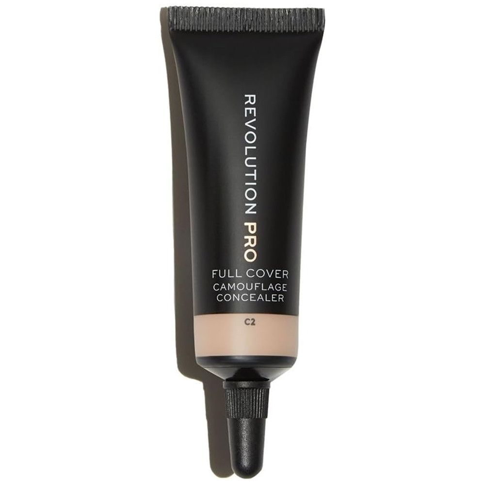 Tube noir de correcteur. Inscription: Revolution Pro, Full Cover Camouflage Concealer. Teinte C2.