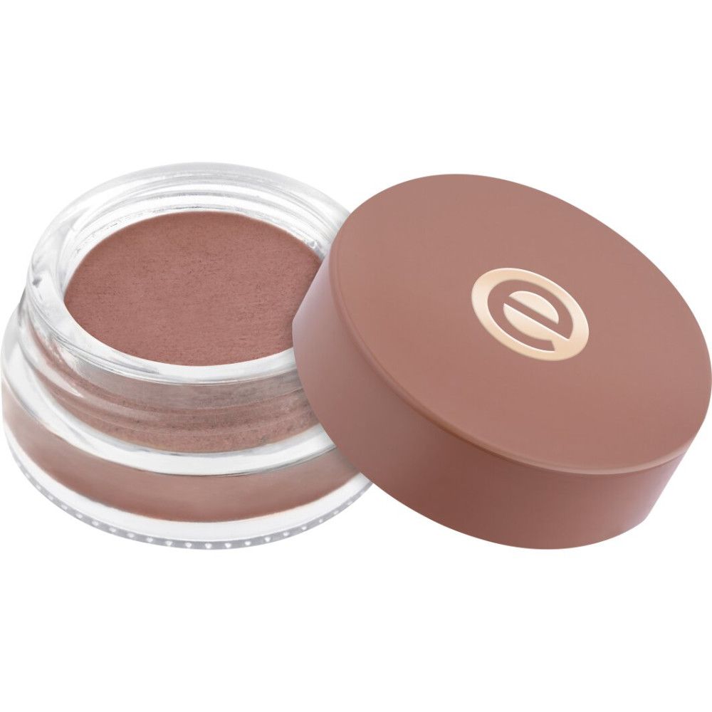 Essence Fard à Paupières Crème Mat in een doorzichtig glazen potje met bruine deksel.