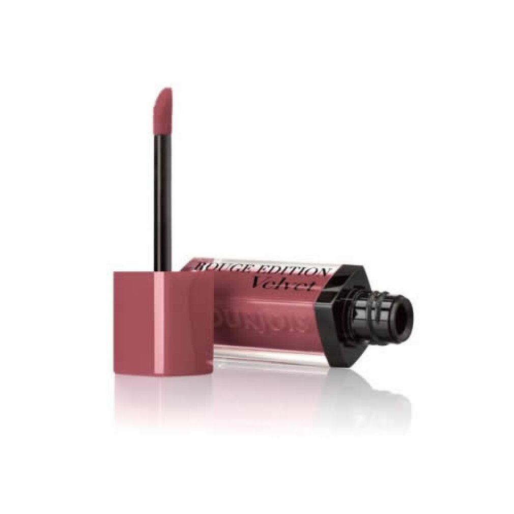 Vloeibare matte lipstick, flesje liggend, applicator ernaast, matte roze finish.