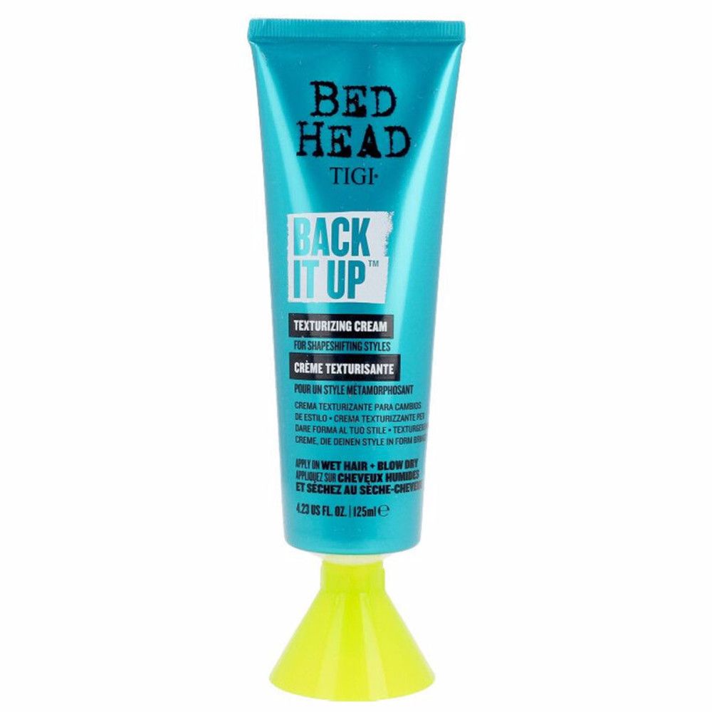 Tube turquoise avec pied jaune. Inscription: Bed Head TIGI Back It Up Texturizing Cream. 125ml.