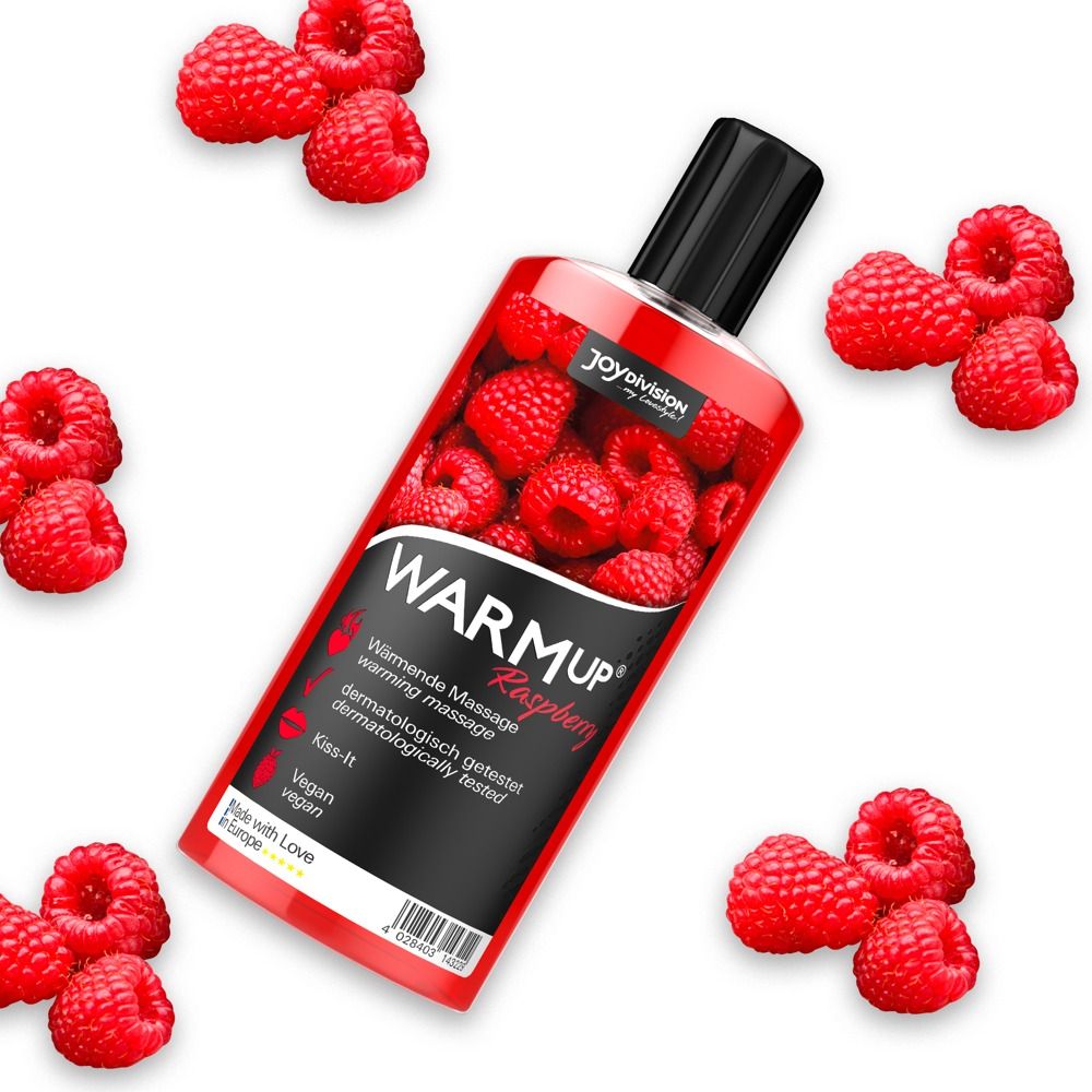 Flacon avec motif framboise. Inscription: WARM UP Raspberry. Testé dermatologiquement, végétalien. Des framboises entourent le flacon.