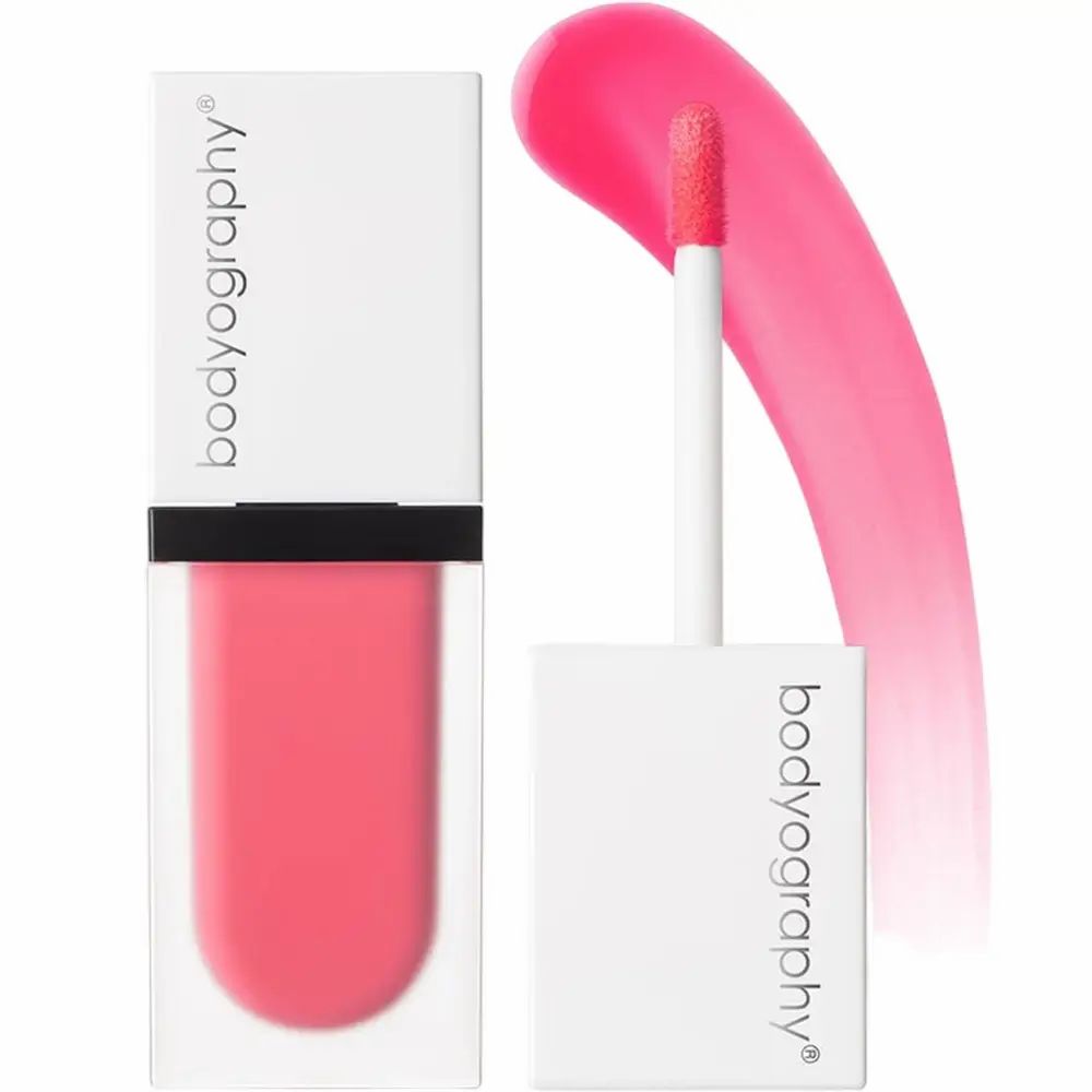 BODYOGRAPHY vloeibare blush met applicator. Roze tint. Witte dop, transparante houder. Product ernaast.