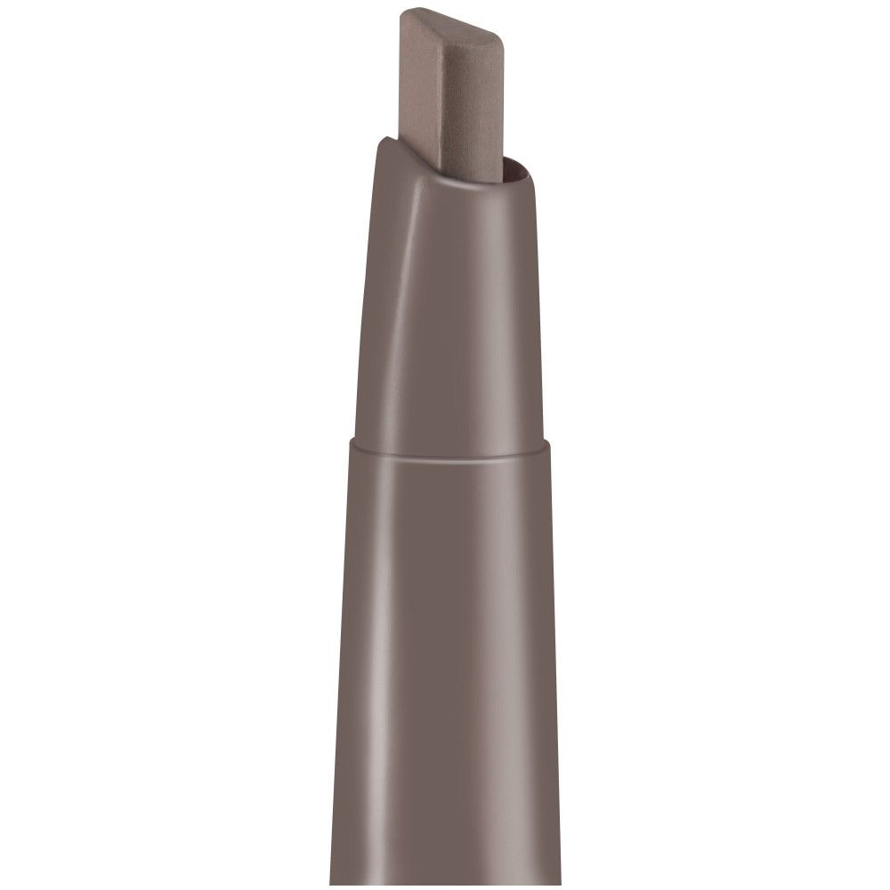 Gros plan de la pointe du crayon. Forme biseautée, couleur brun clair.