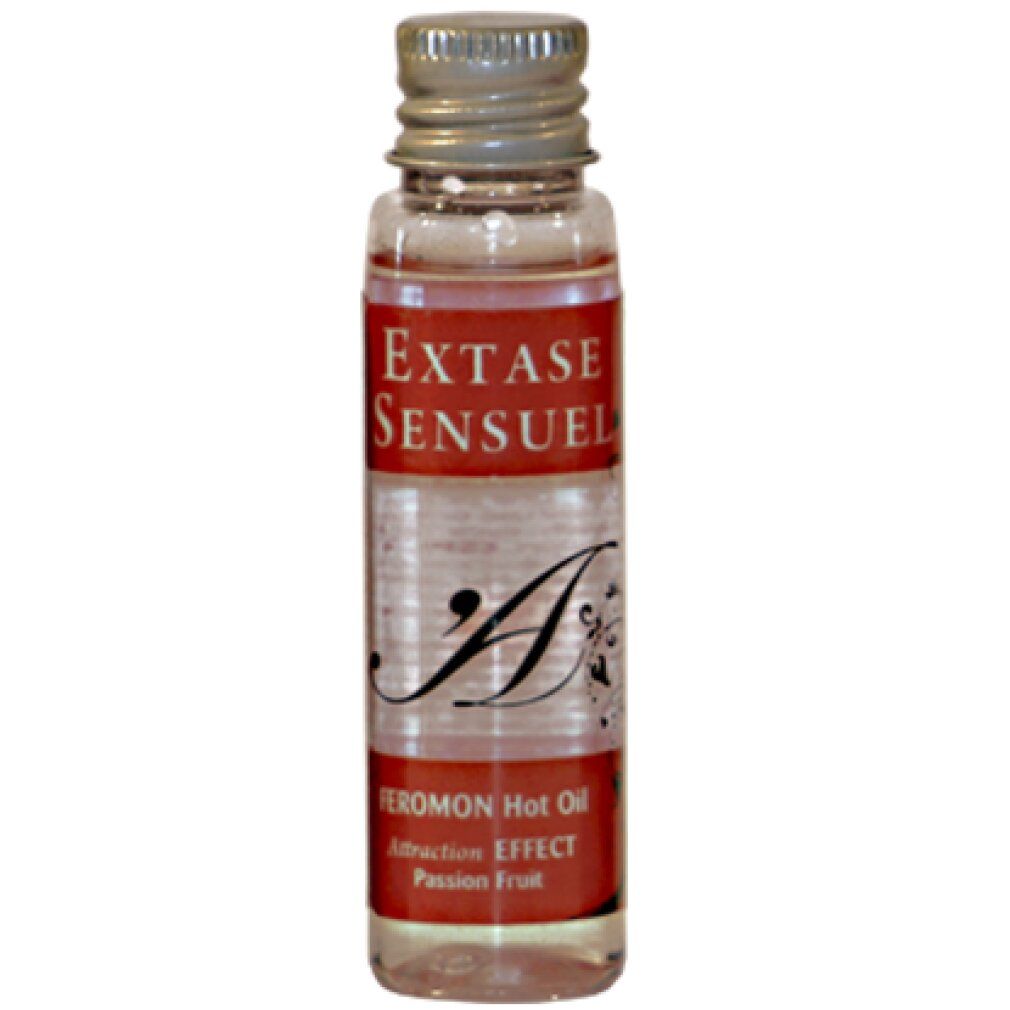 Petite bouteille d'huile transparente, étiquette avec 'EXTASE SENSUEL' et 'FEROMON Hot Oil'.