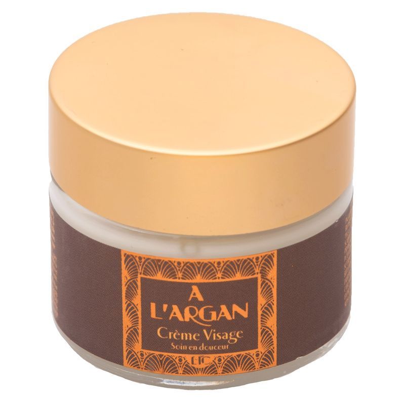 Ronde pot met gouden deksel. Op het bruine etiket staat "A L'ARGAN Crème Visage". 